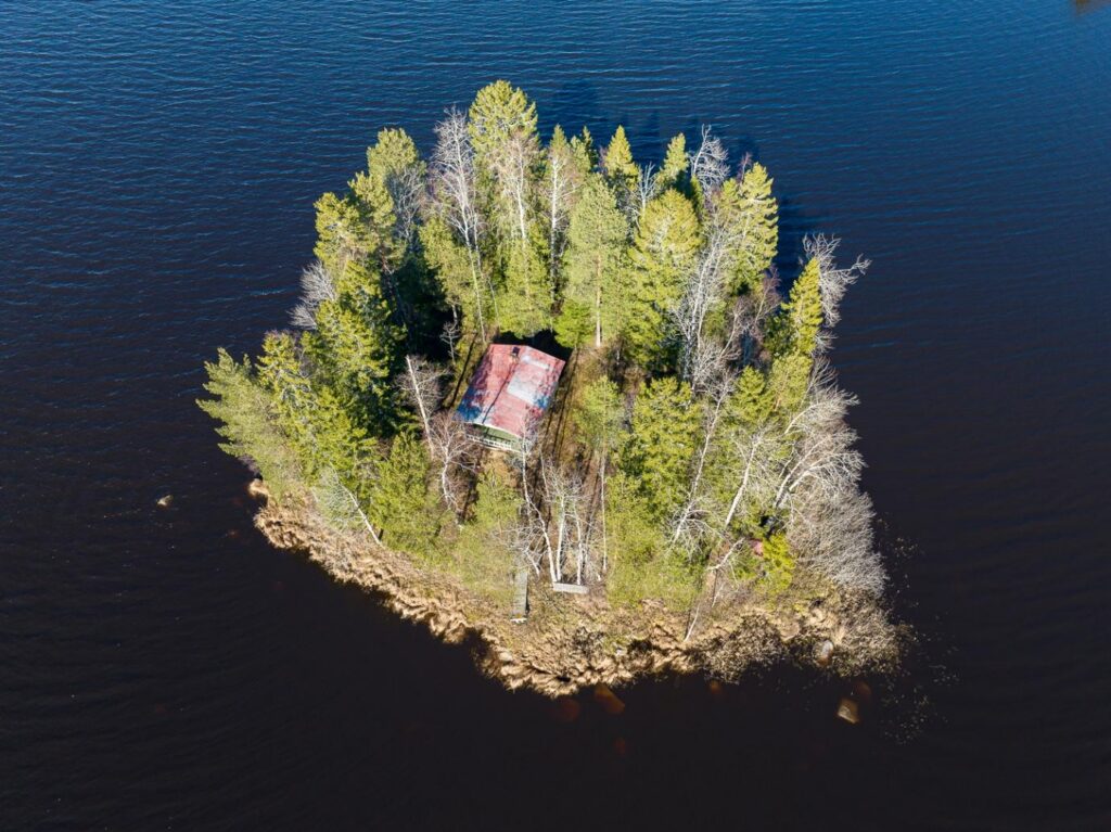 The entire Finnish islet spans just under one-third of an acre, with a 300-square-foot cottage tucked among the trees.